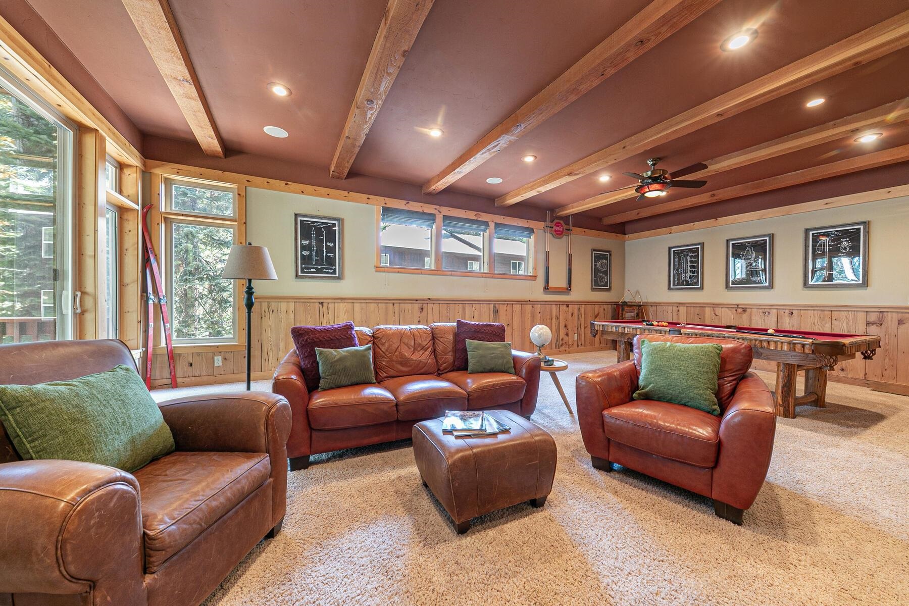 11707 Ski Slope Way Truckee, CA 96161 - Photo 19 of 28 a living room with furniture and a large window