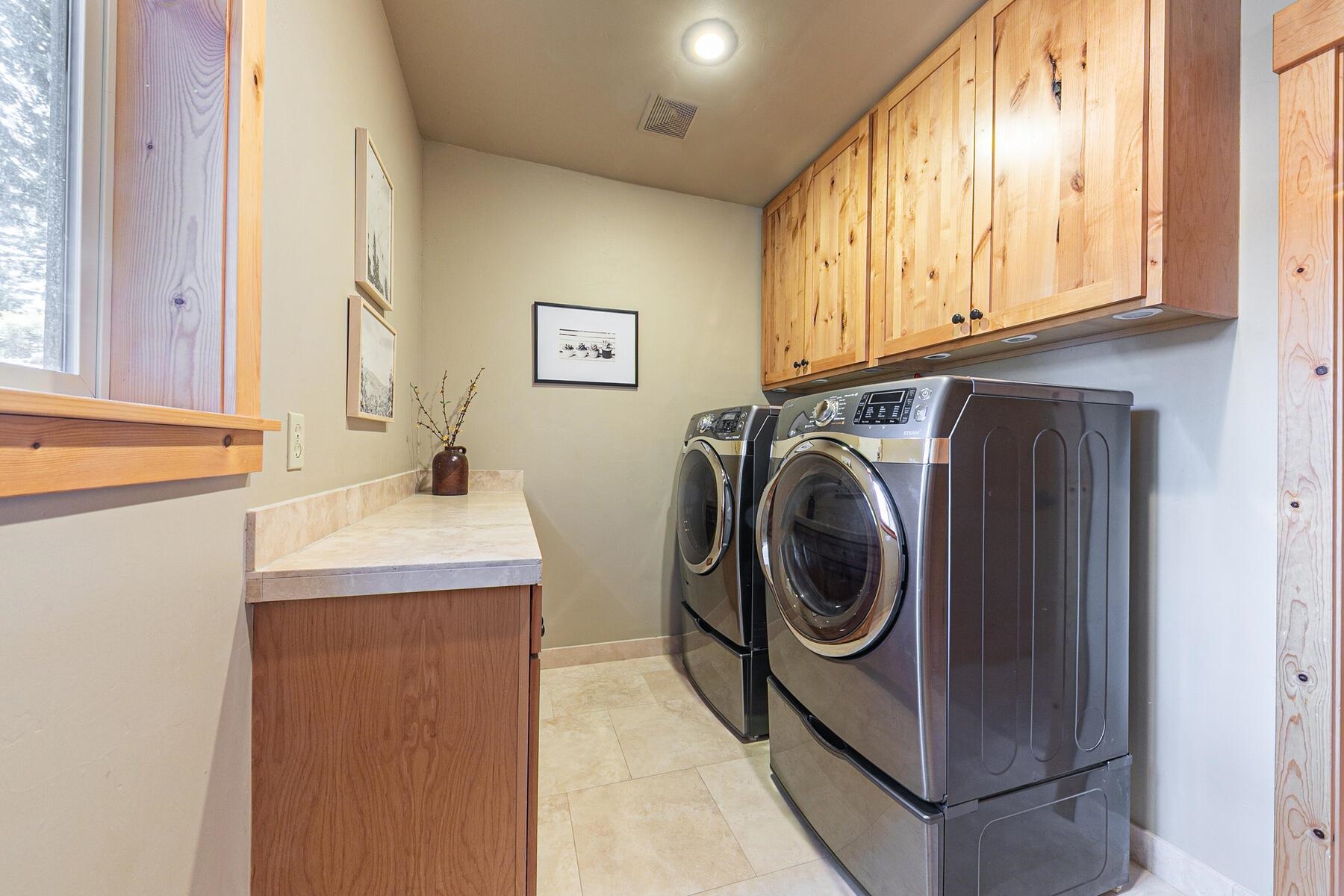 11707 Ski Slope Way Truckee, CA 96161 - Photo 25 of 28 a utility room with dryer and washer