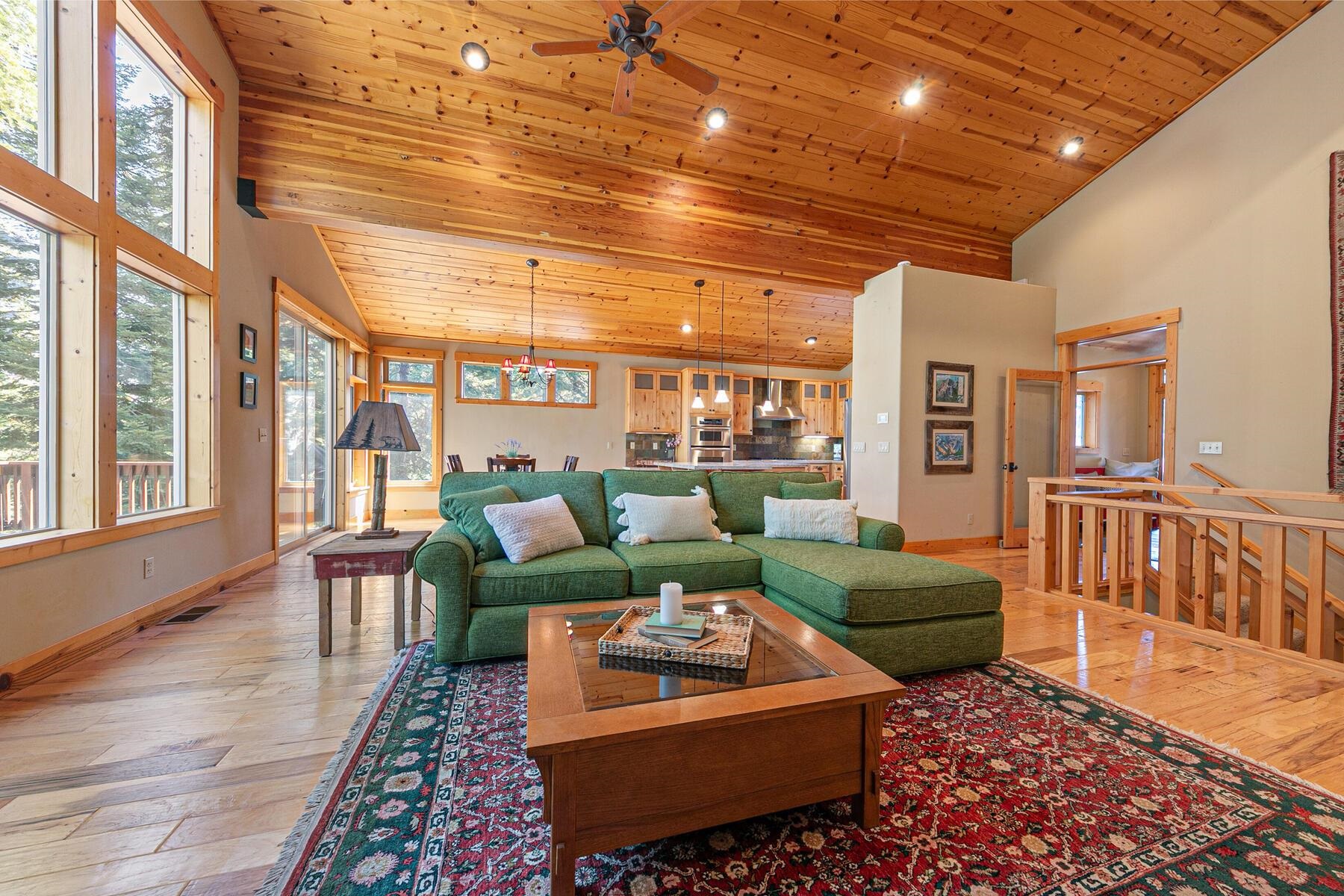 11707 Ski Slope Way Truckee, CA 96161 - Photo 9 of 28 a living room with furniture a rug and a large window