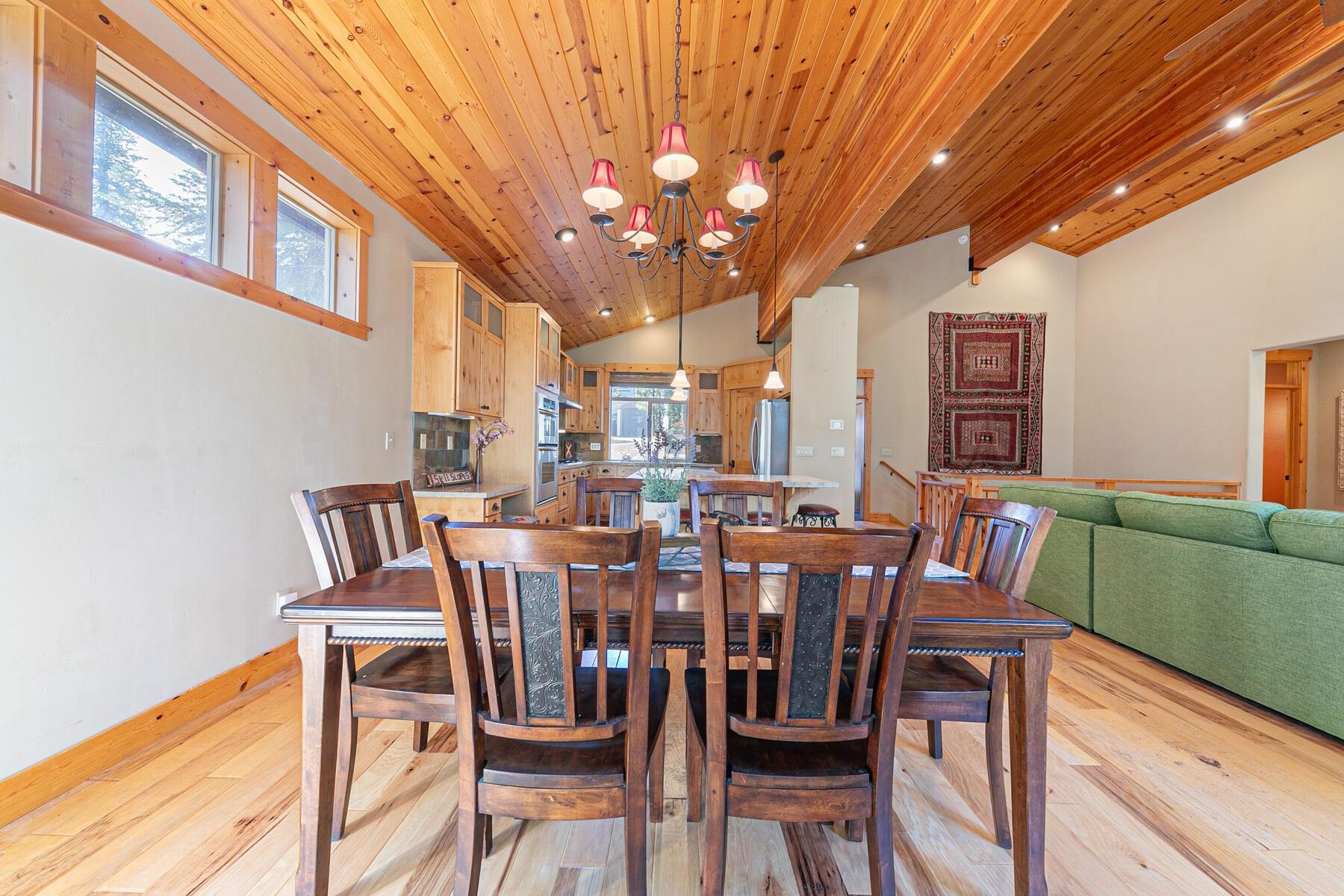 11707 Ski Slope Way Truckee, CA 96161 - Photo 10 of 28 a view of a dining room with furniture and chandelier