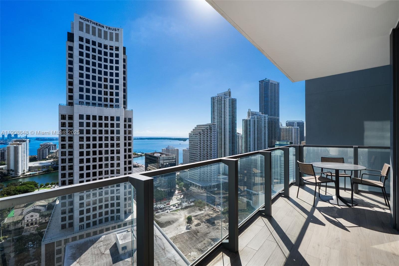 68 Southeast 6th Street, Unit 2505 Miami, FL 33131 - Photo 16 of 18 a view of balcony with wooden floor