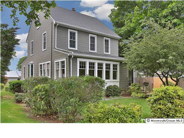 a view of a house with a garden