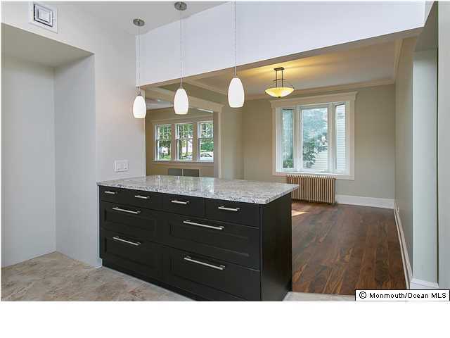 80 Black Point Road Rumson, NJ 07760 - Photo 4 of 11 a bathroom with a sink a vanity and a mirror