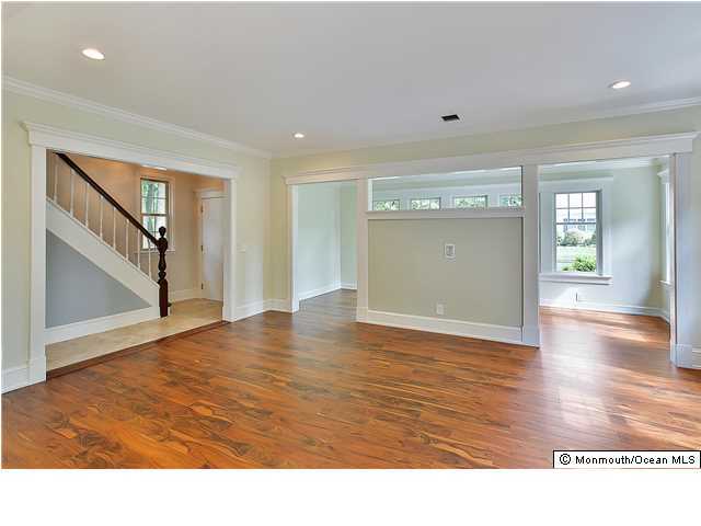 80 Black Point Road Rumson, NJ 07760 - Photo 5 of 11 a view interior of the house and empty room with wooden floor