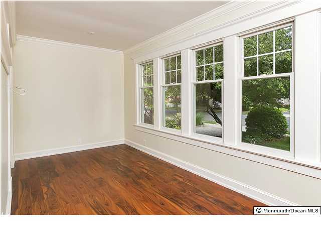 80 Black Point Road Rumson, NJ 07760 - Photo 7 of 11 a bathroom with a sink and a large window