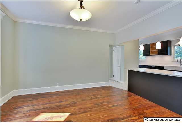 80 Black Point Road Rumson, NJ 07760 - Photo 8 of 11 a view of empty room with wooden floor