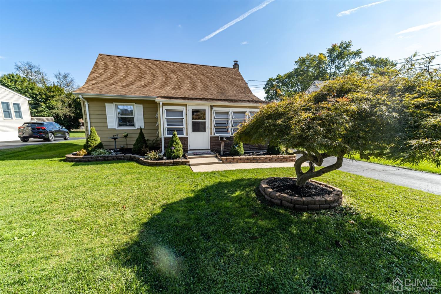 142 Weiss Terrace Raritan, NJ 08869 - Photo 2 of 29 a view of a house with swimming pool and sitting area