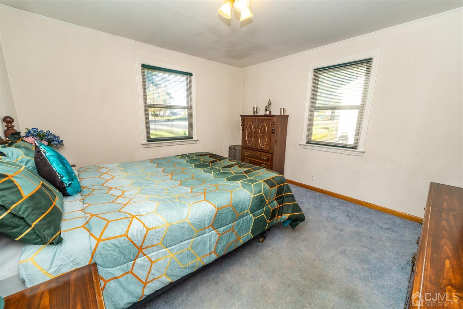 142 Weiss Terrace Raritan, NJ 08869 - Photo 16 of 29 a bedroom with a bed and a window