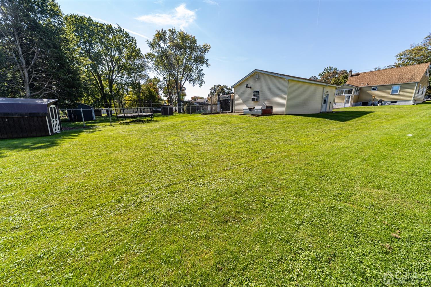 142 Weiss Terrace Raritan, NJ 08869 - Photo 26 of 29 a view of a house with a yard