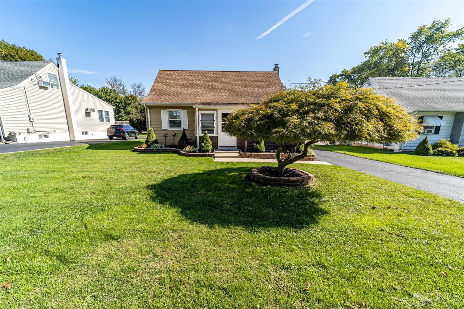 142 Weiss Terrace Raritan, NJ 08869 - Photo 29 of 29 a view of a house with a yard and sitting area