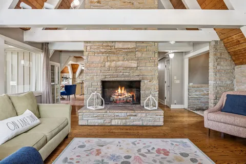 a kitchen with stainless steel appliances granite countertop a refrigerator and a stove