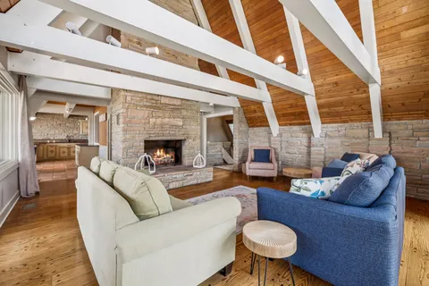 a kitchen with stainless steel appliances a stove top oven and cabinets