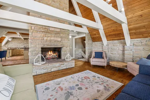 a kitchen with stainless steel appliances granite countertop a refrigerator and a stove