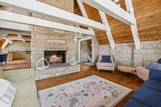a kitchen with stainless steel appliances granite countertop a refrigerator and a stove