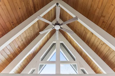 a view of a livingroom with furniture and windows