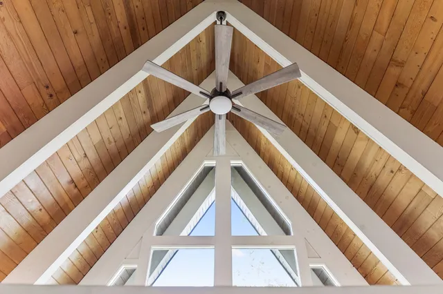 a view of a livingroom with furniture and windows