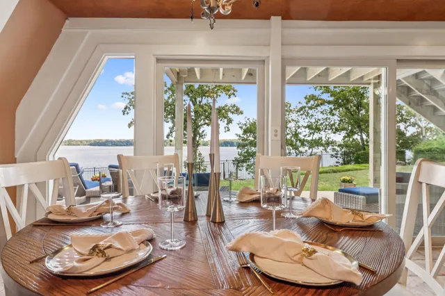 a view of entryway with wooden floor and stairs
