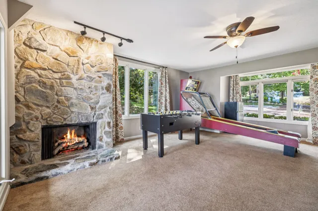 a view of a backyard with sitting area