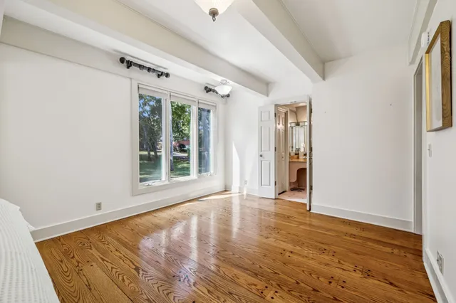 an aerial view of a house with lake view