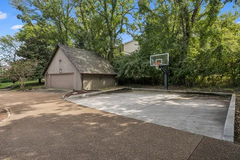 a front view of a house with wooden stairs