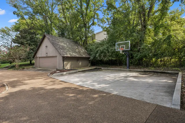 a front view of a house with wooden stairs