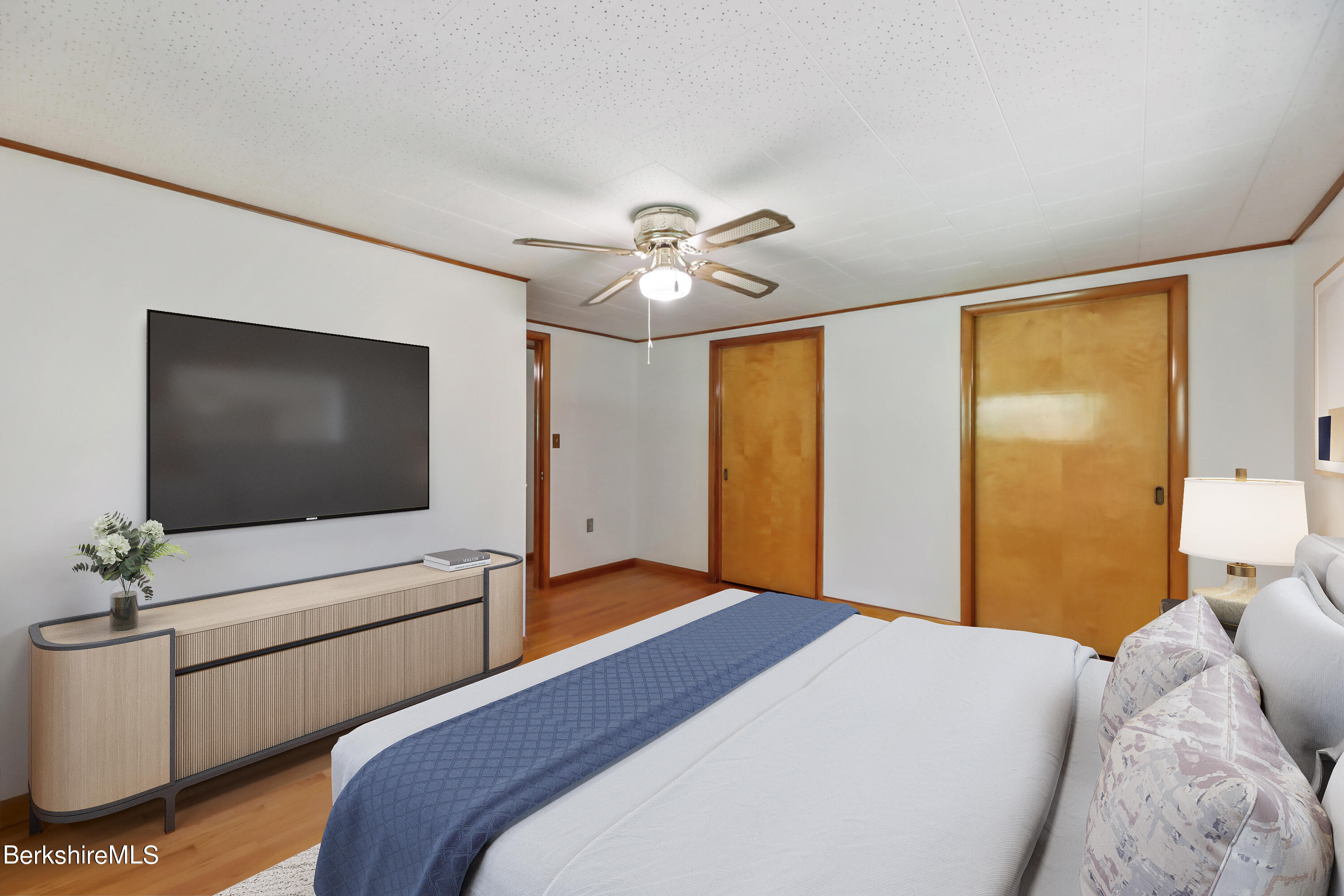 352 Monterey Road Otis, MA 01253 - Photo 23 of 41 a bedroom with a bed and a flat screen tv