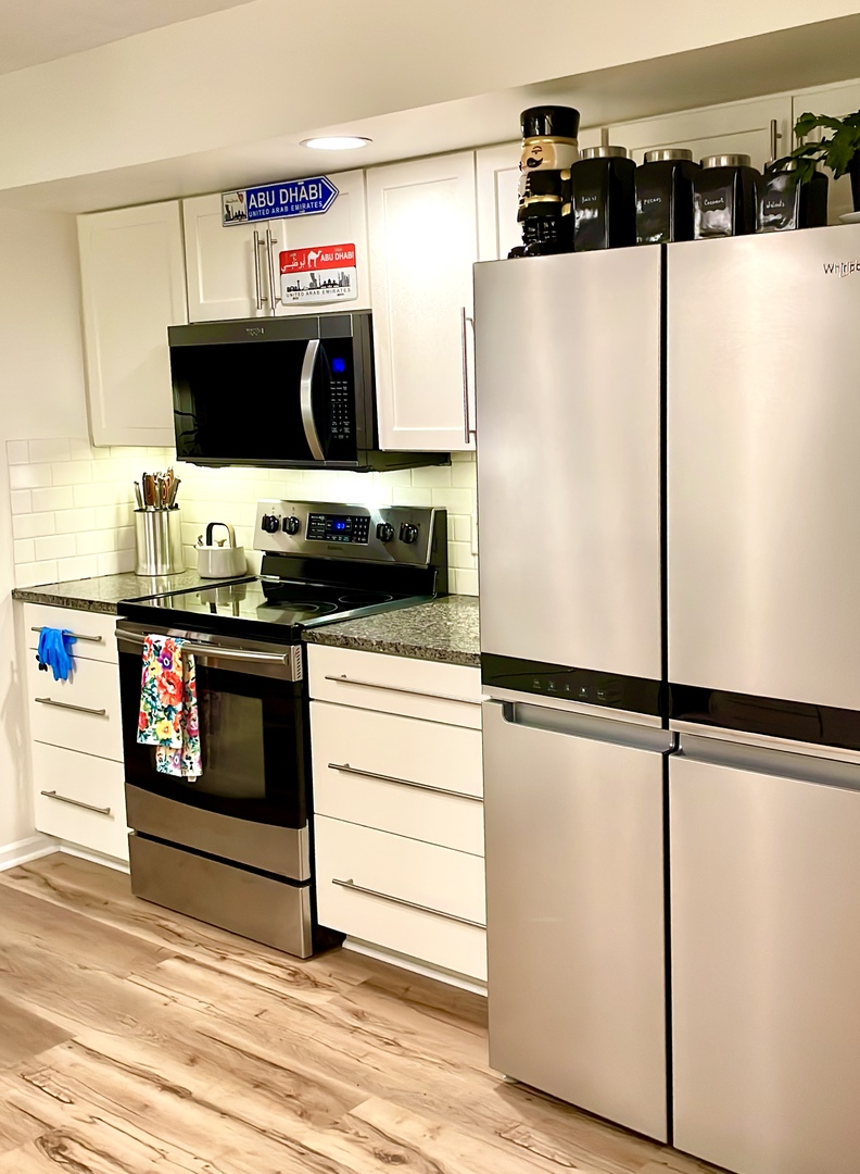 120 Grandin Road Morris, IL 60450 - Photo 9 of 28 a kitchen with stainless steel appliances a refrigerator and a stove top oven