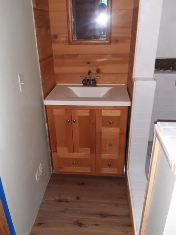 a view of balcony and wooden floor