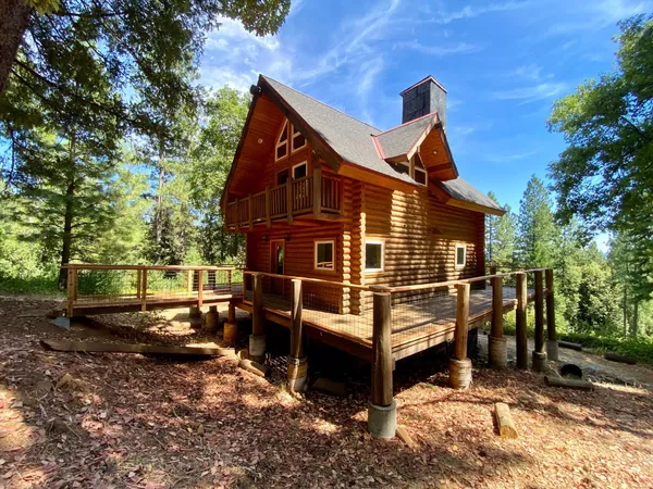 a view of balcony with wooden floor