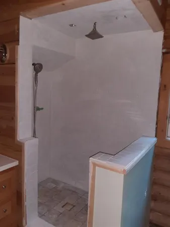 a view of balcony with furniture