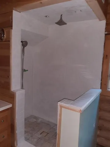 a view of balcony with furniture