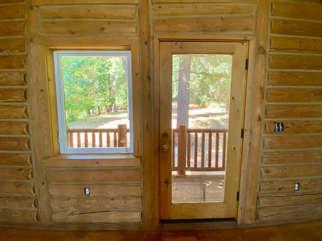 a view of a yard covered with snow in outdoor space