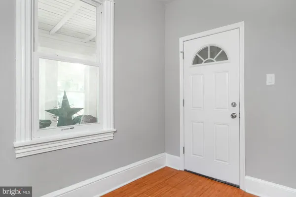 a view of a room that has a window in it