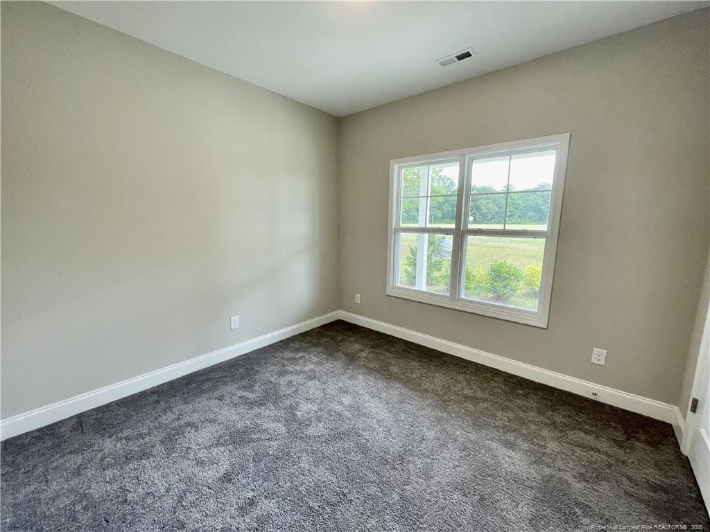 5177 Maxwell Road Stedman, NC 28391 - Photo 10 of 24 an empty room with a window