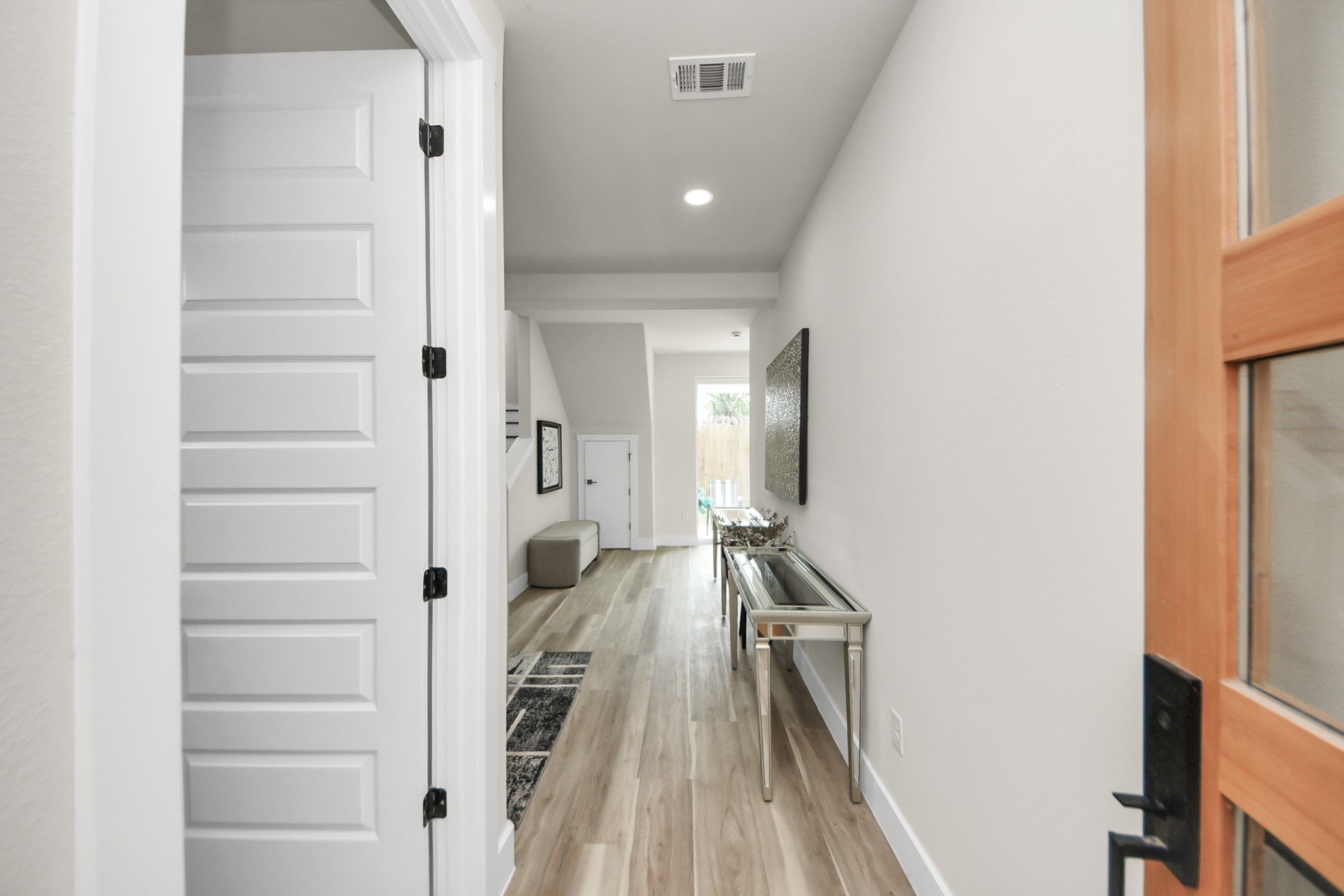 2014 Blodgett Street Houston, TX 77004 - Photo 4 of 49 a view of a living room with a wooden floor