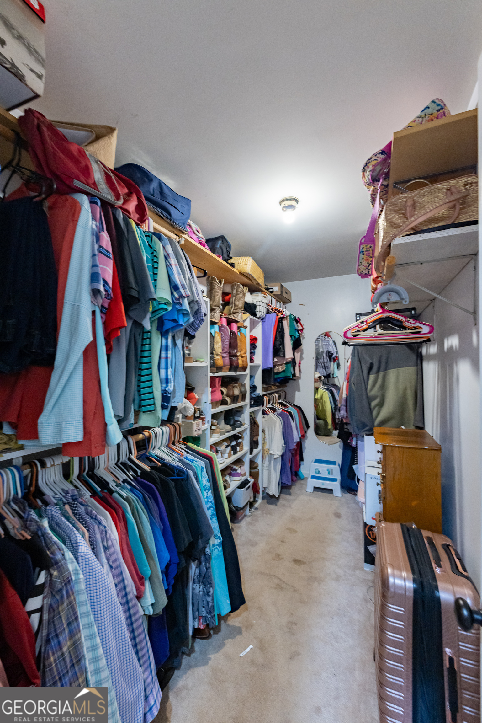 202 Daniel Road Thomaston, GA 30286 - Photo 14 of 112 a view of walk in closet with clothes and shoes