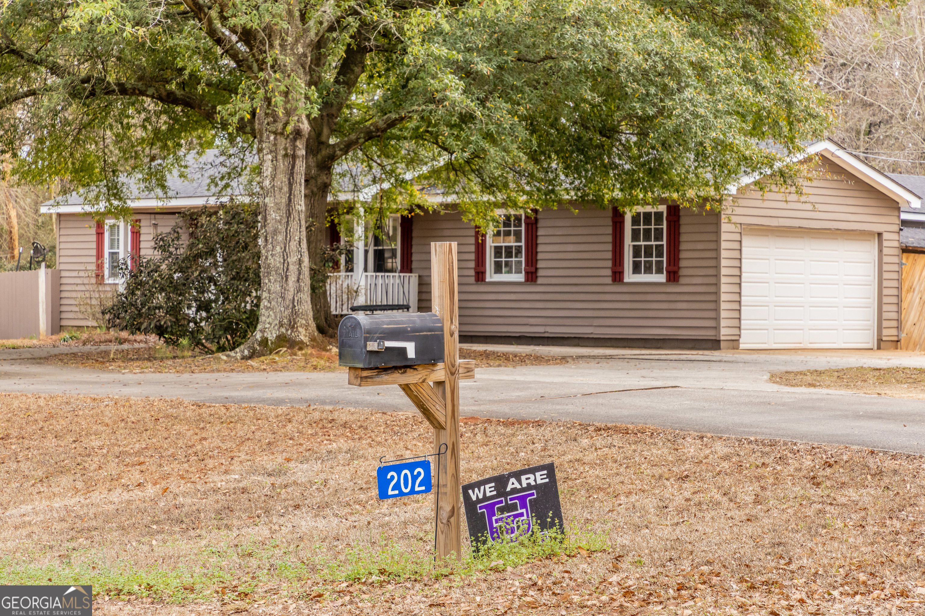 202 Daniel Road Thomaston, GA 30286 - Photo 45 of 112 a view of a house with a tree in the background