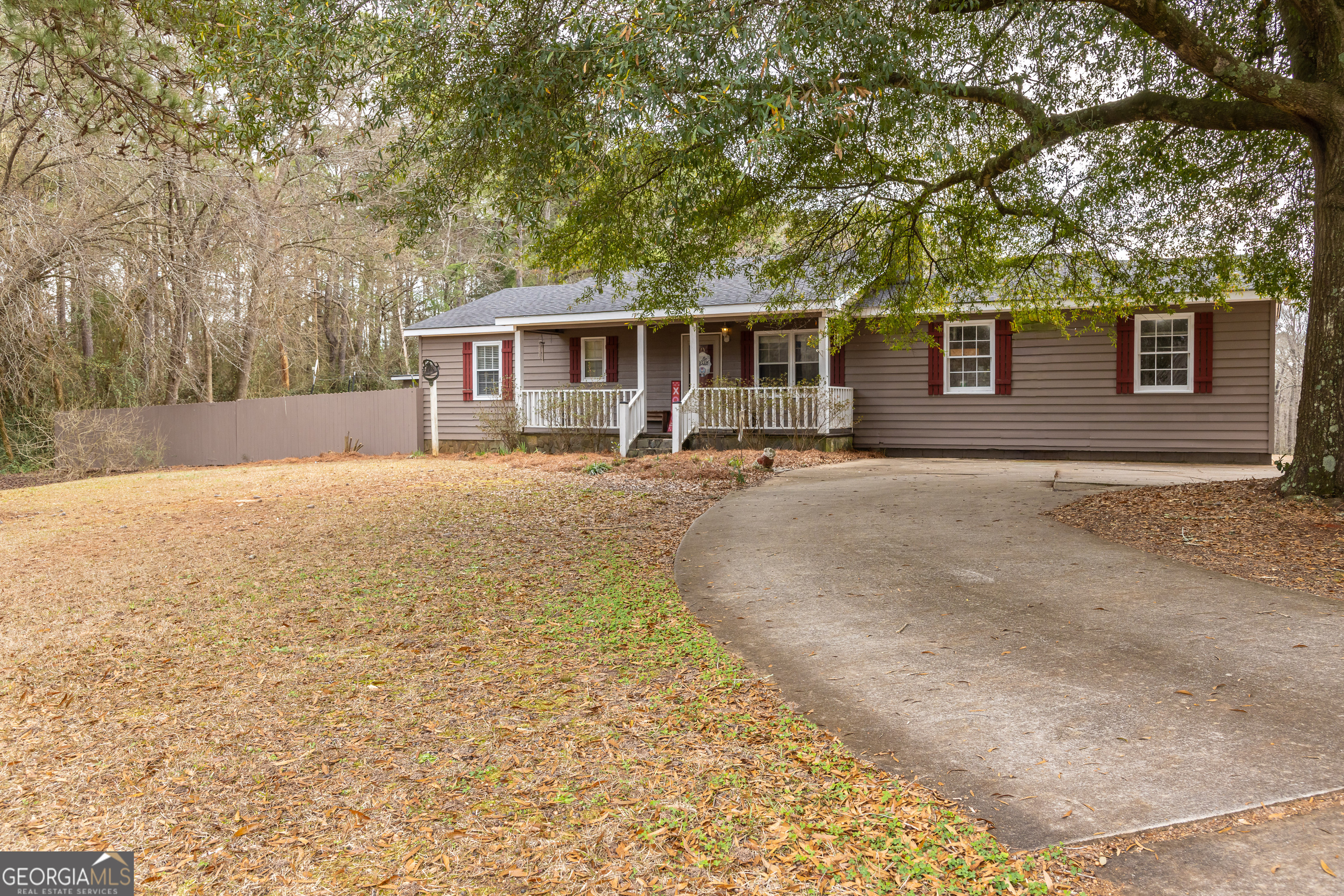 202 Daniel Road Thomaston, GA 30286 - Photo 60 of 112 front view of a house with a yard