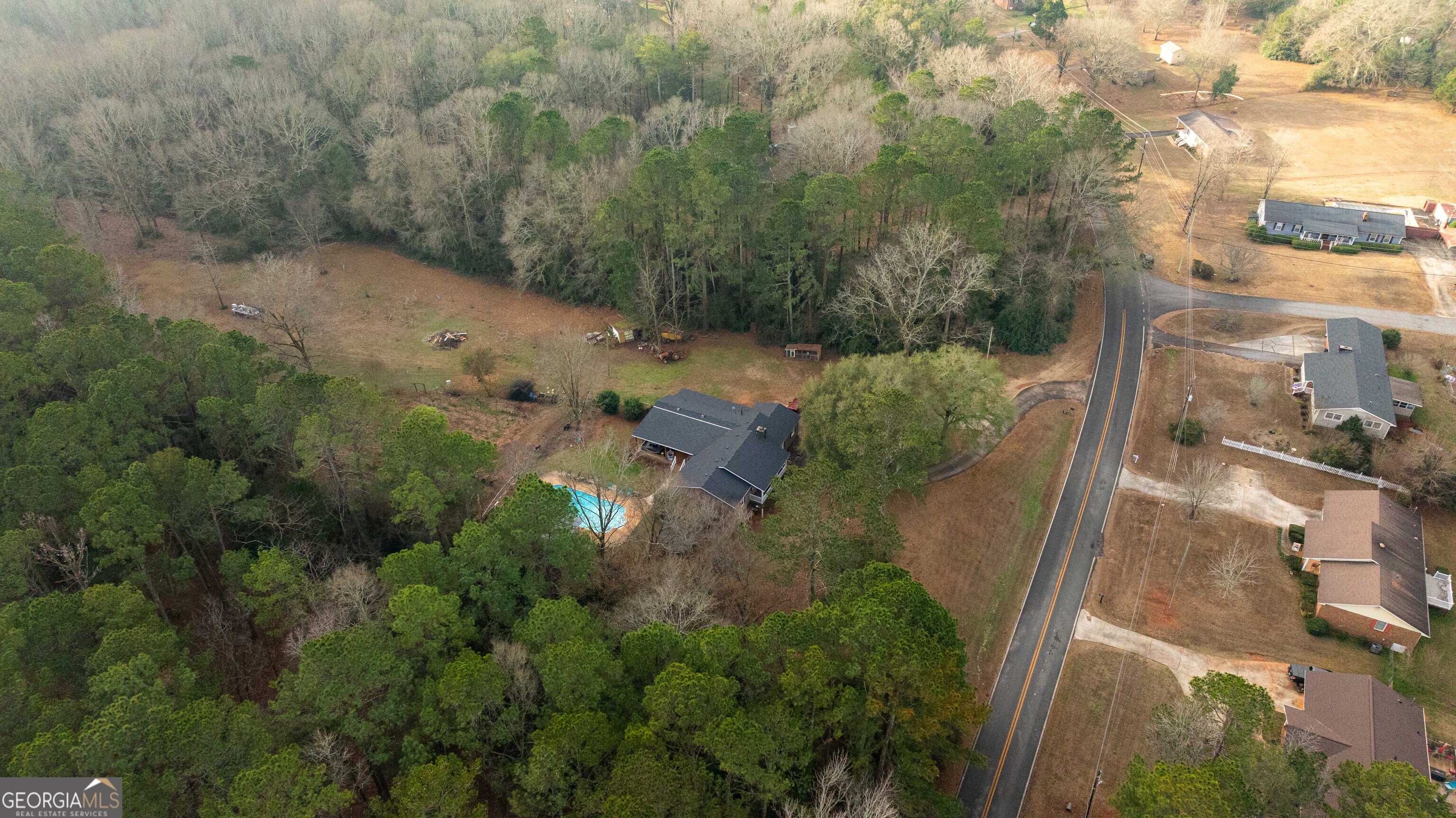 202 Daniel Road Thomaston, GA 30286 - Photo 65 of 112 an aerial view of residential house with outdoor space