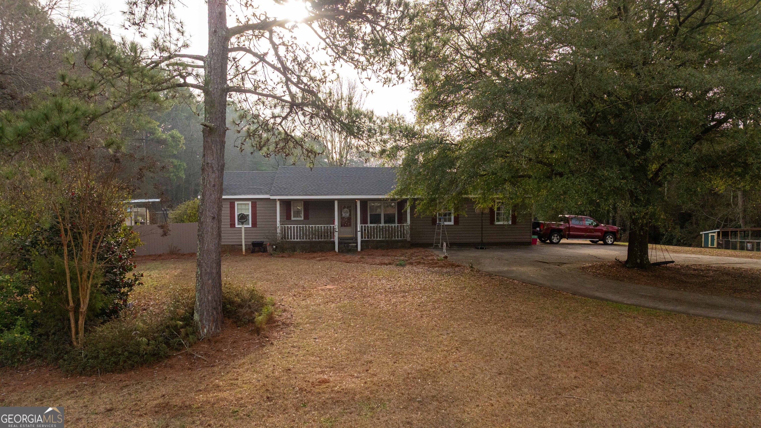 202 Daniel Road Thomaston, GA 30286 - Photo 92 of 112 a view of a car parked on the side of road