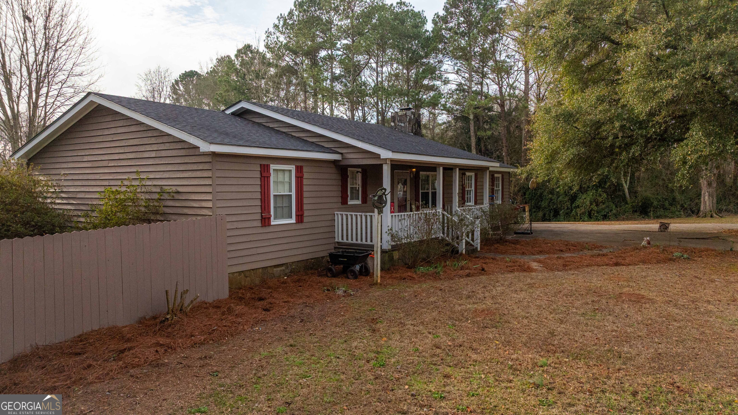 202 Daniel Road Thomaston, GA 30286 - Photo 94 of 112 a view of a house with a yard and large tree