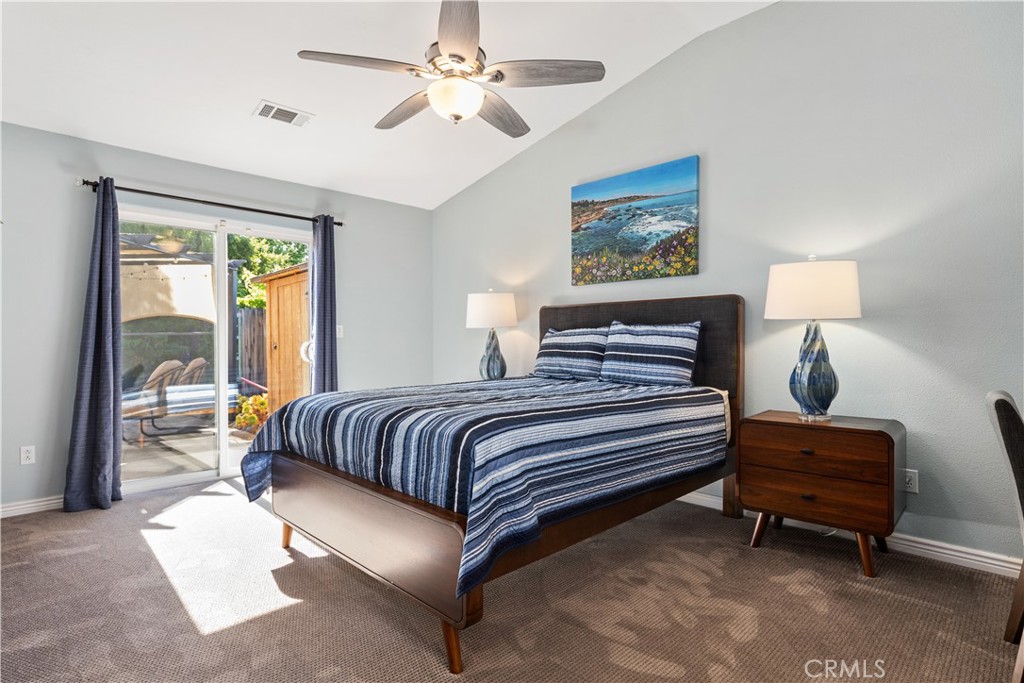 408 Turtle Creek Road Paso Robles, CA 93446 - Photo 21 of 35 a bedroom with bed and a chandelier