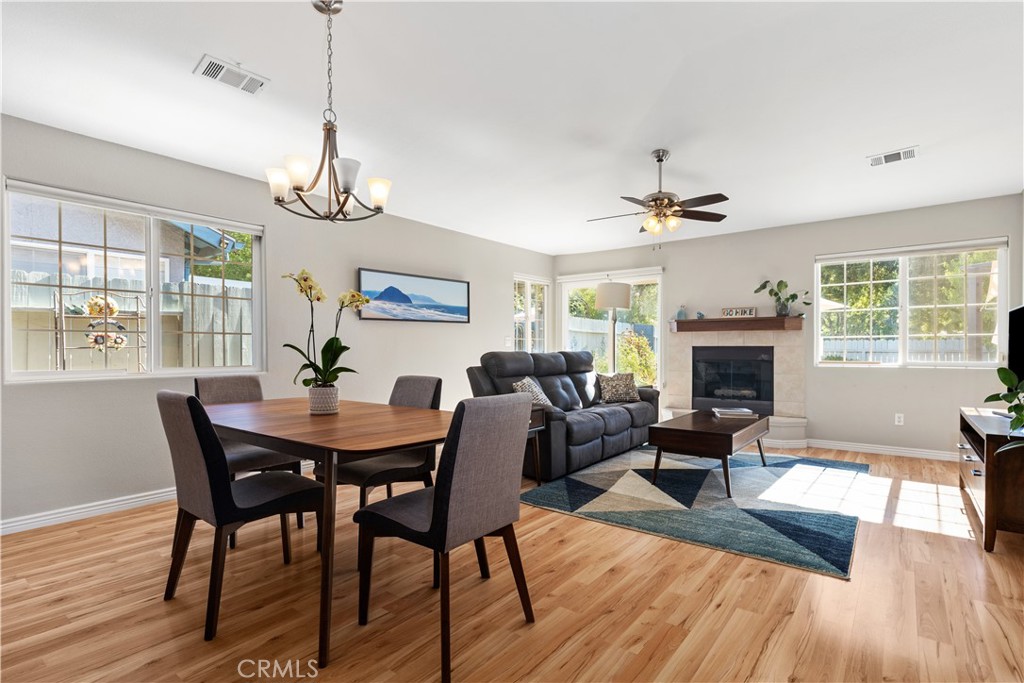408 Turtle Creek Road Paso Robles, CA 93446 - Photo 9 of 35 a view of a dining room with furniture window and wooden floor