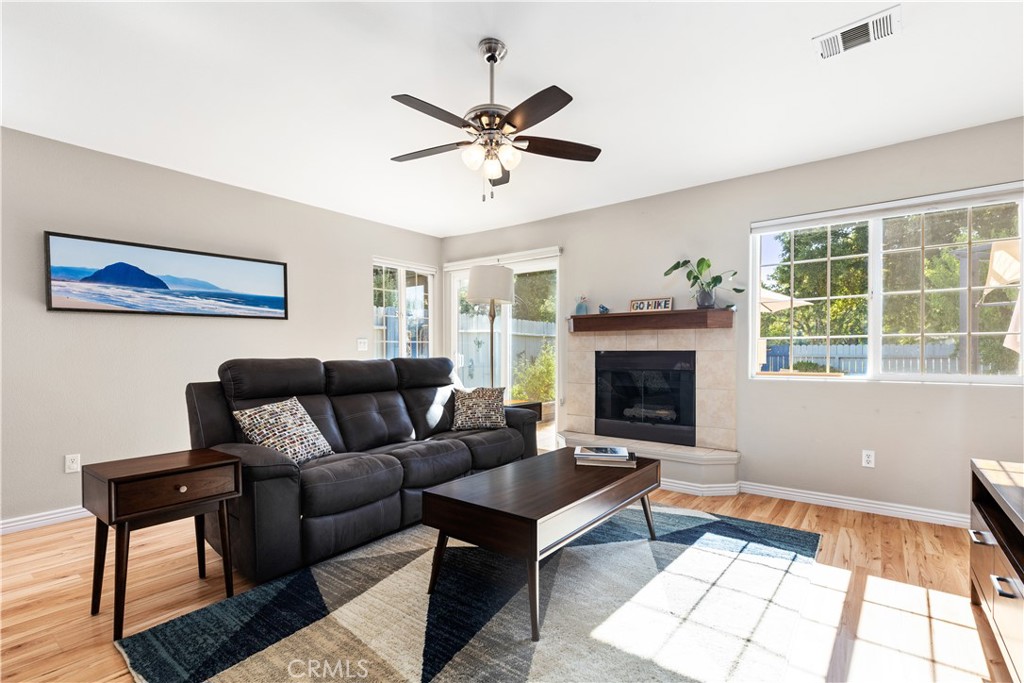 408 Turtle Creek Road Paso Robles, CA 93446 - Photo 10 of 35 a living room with furniture and a fireplace