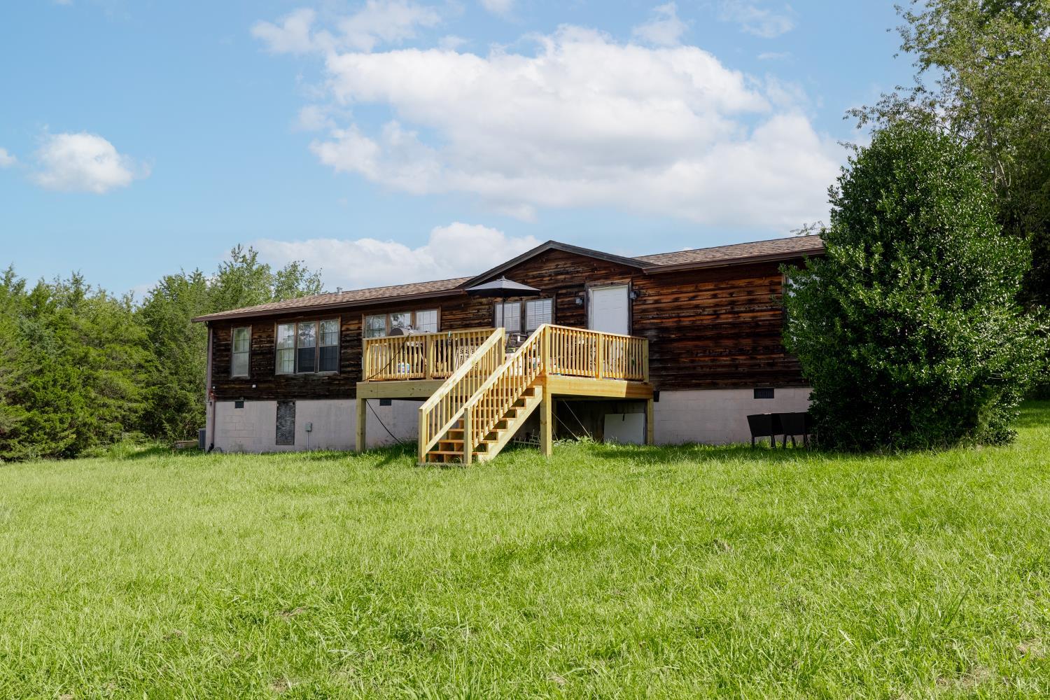 2307 Everett Road Forest, VA 24551 - Photo 24 of 31 a view of a house with a yard and deck