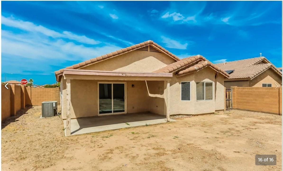 12563 West Charter Oak Road El Mirage, AZ 85335 - Photo 16 of 16 a view of a house with a yard