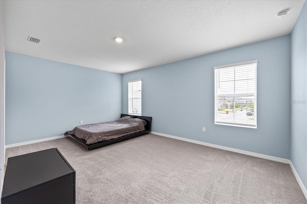 1680 Hazy Sea Drive Plant City, FL 33565 - Photo 25 of 49 a living room with furniture and a window