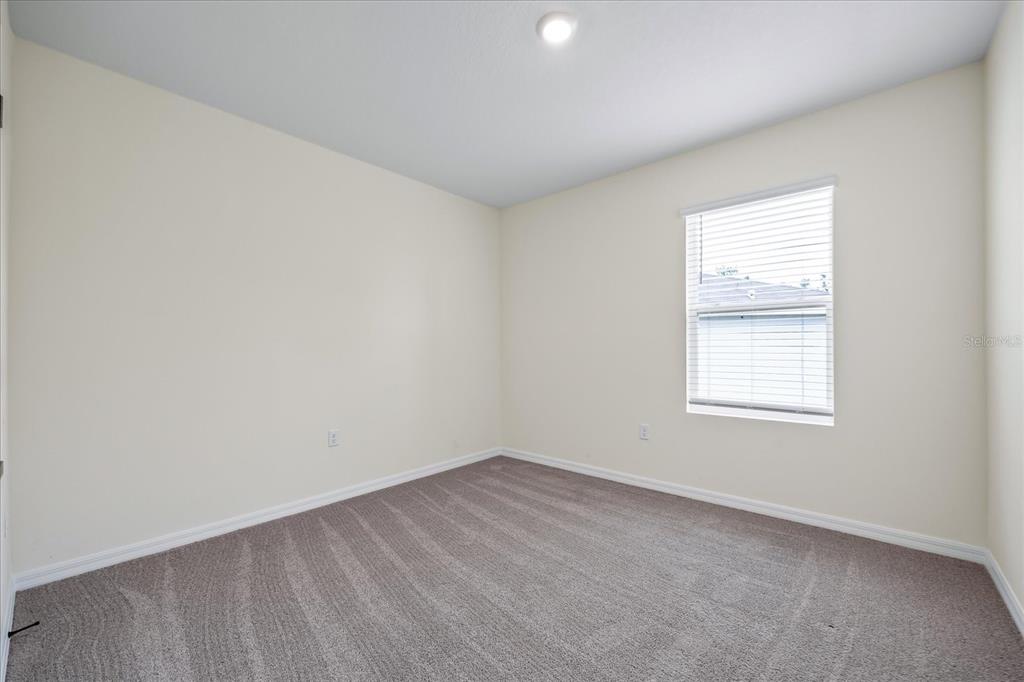 1680 Hazy Sea Drive Plant City, FL 33565 - Photo 32 of 49 an empty room with a window