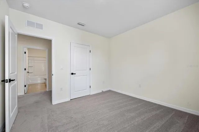 a view of a back yard of the house