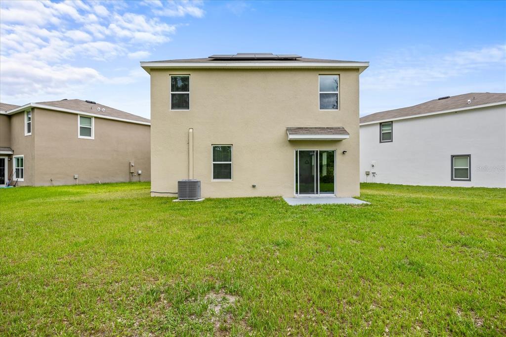 1680 Hazy Sea Drive Plant City, FL 33565 - Photo 38 of 49 a view of a house with backyard